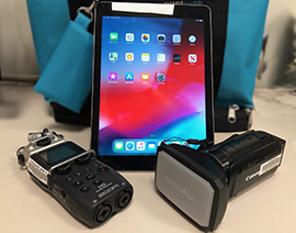 photo of audio recorder,iPad and camera