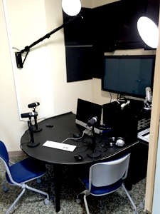 view of MRC podcast, monitors, keyboard imac