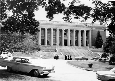 Dinand Library in the 1950s. Dinand Library was named after Bishop Joseph Dinand, S.J., 16th president of the College. 