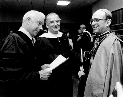 Honorary degree recipients Joe Dimaggio and Joseph Cardinal Bernardin with Edward Bennett Williams,, class of 1941 at 1983 commencement
