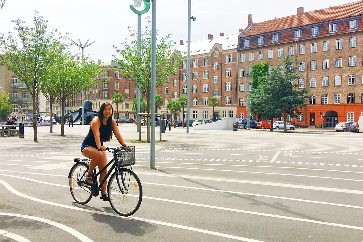 Katie-Li Walker ’18, a double major in architectural studies and studio art, bikes through Superkilen, a public park in the Nørrebro district of Copenhagen, Denmark during her time abroad.
