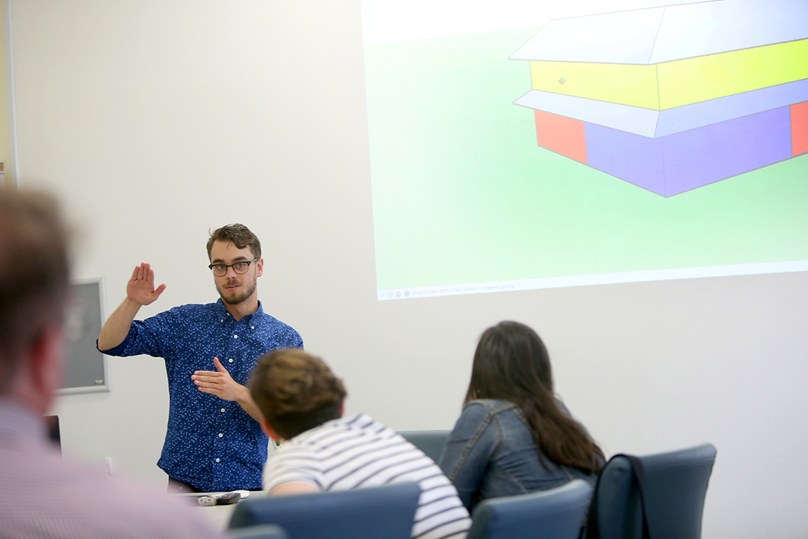 Joe Metrano ’18, a double major in architectural studies and studio art, works on his summer research project, titled "Rethinking Home: A Design Proposal for Sustainable Housing at HC."