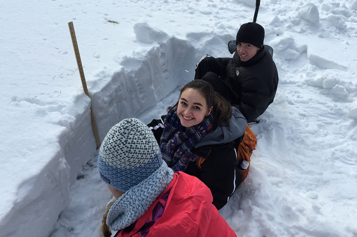 students in a snow pack