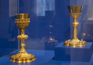 Two gold and jewel encrusted chalices for use in the Mass.