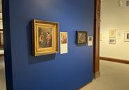 Installation view of painting of Holy Family in gold frame.