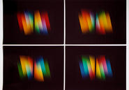 Color image with black background and four rainbow spectrums in four quadrants