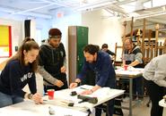 Kevork Mourad works with students in Intermediate Drawing