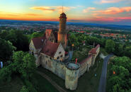 Aerial view of the Altenburg, a castle that sits on top of the tallest of the seven hills of Bamberg, Germany. 