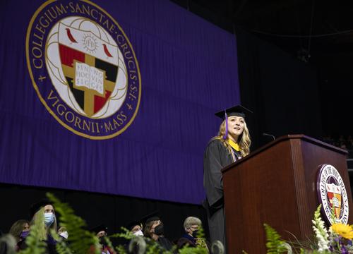 Holy Cross valedictorian Rebecca Hannion delivers her remarks from the stage at commencement
