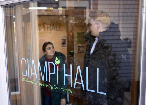 Students are seen through a glass window labelled with the words "Ciampi Hall"