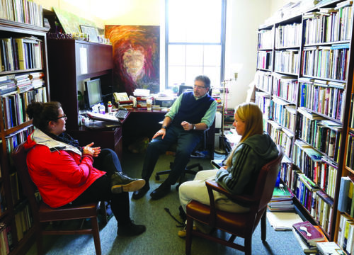 Student office hours during the 2015-16 academic year with Mark Freeman, Holy Cross Distinguished Professor of Ethics and Society and professor of psychology. Photo by Tom Rettig