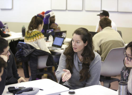Ja-Na? Duane works with students in Stein Hall in 2018.