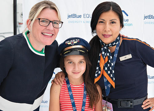 Joanna Geraghty '90 (far left) president and chief operating officer of JetBlue Airways, is one of the highest ranking women in the U.S. airline industry today, leading with a distinctive Holy Cross mindset: service, values and community.