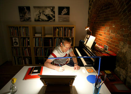 Osvaldo Golijov is pictured here working in his music studio. Photo by Tom Rettig