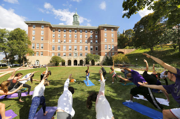 students practicing yoga in Stein Courtyard