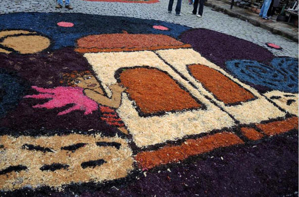 a tapete, or sawdust carpet, during an Easter procession in Brazil