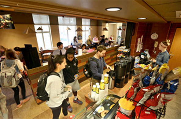 View of Cafe Babel coffee shop as students wait in line to pay for their purchases. 