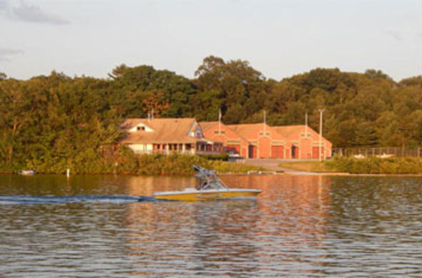donahue rowing center with water boat in center of lake 