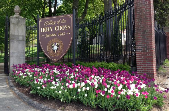 Gate with Holy Cross seal and tulips