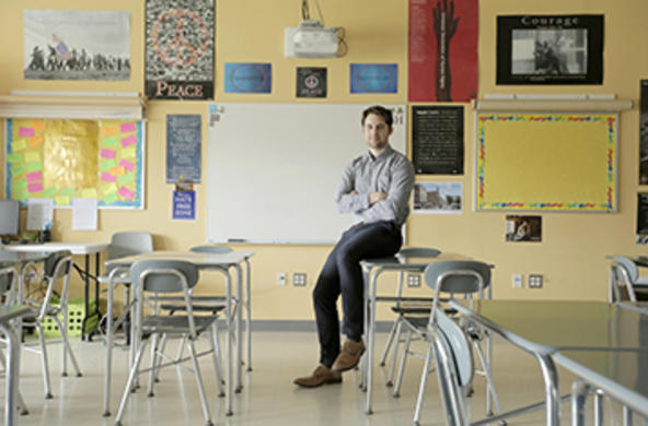 teacher in an empty classroom