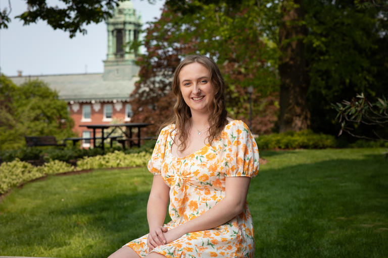 Holy Cross senior Emily Rand poses for a photo on campus