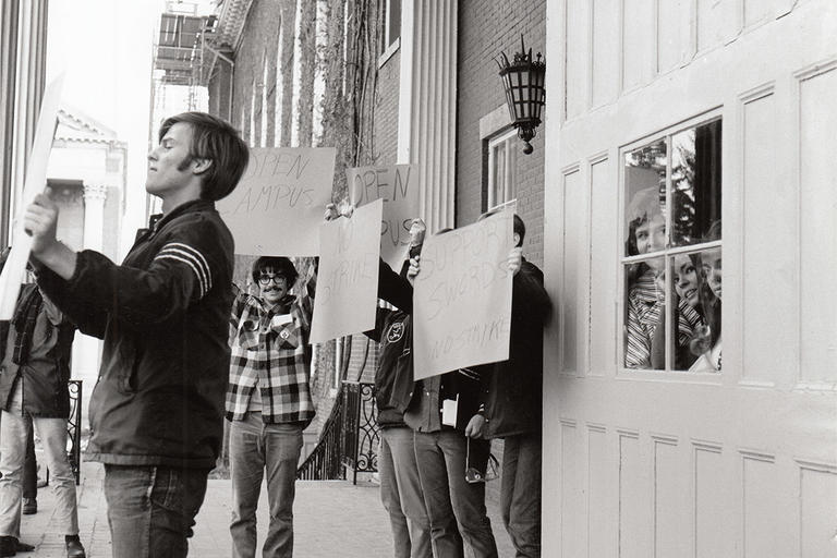 Students gather on Fenwick Porch to protest, a common occurrence during the politically active 1960s.