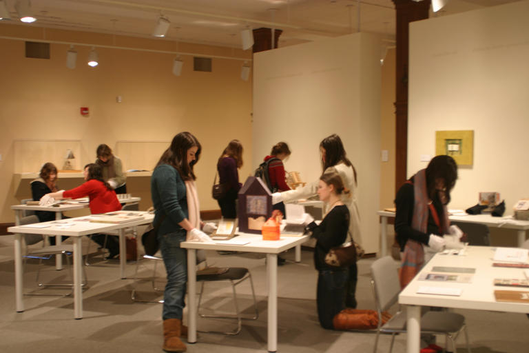 Students viewing Shelter artists' books