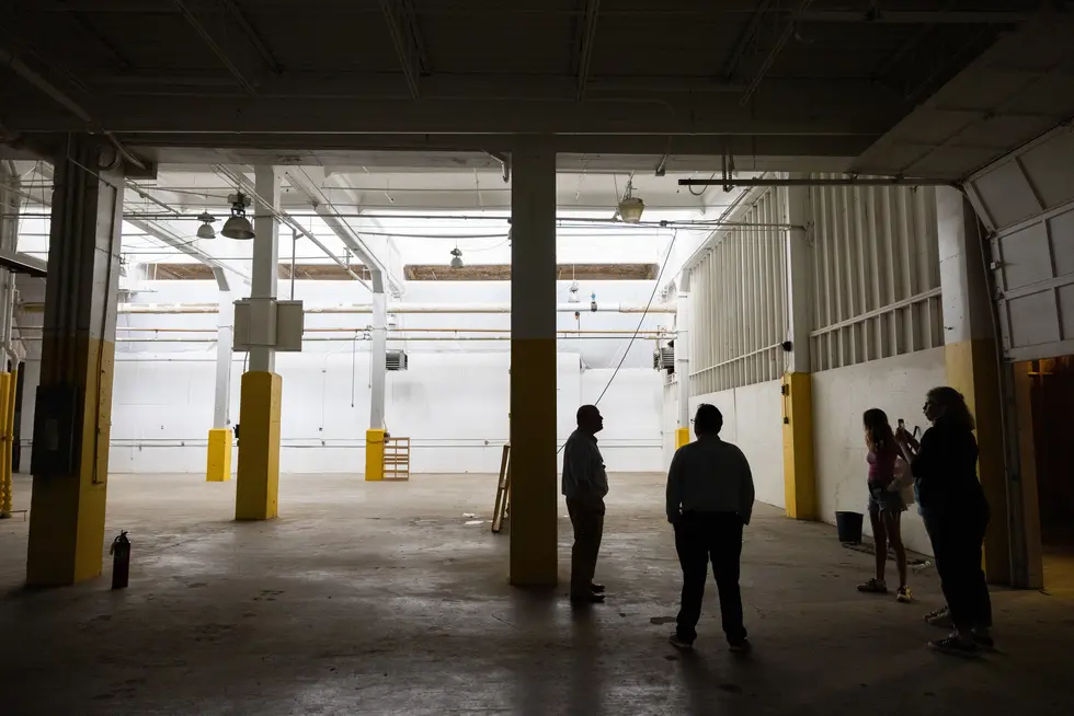 Dan Ricardi takes Mary Conley, Archivist Lenora Robinson, Eric Butler '06 (Museum of Worcester), .Natalie Denon '28 and Katherine Santini 27 on a tour of the Whittall Mills Site, also known as Rottman's Furniture, for a summer research project and class