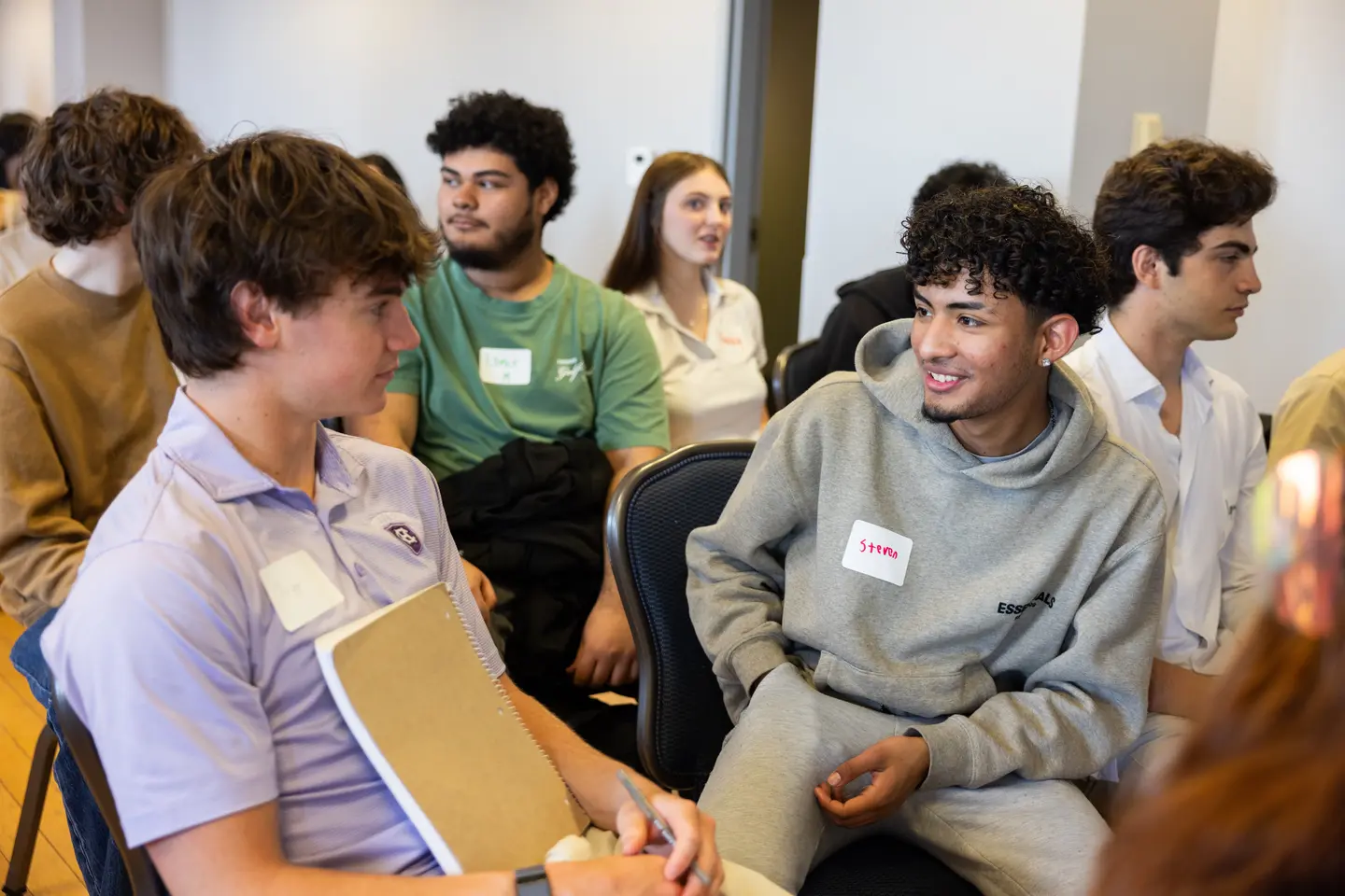 Students have a discussion during a Montserrat exchange meeting