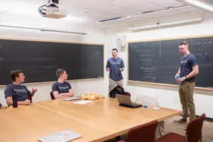 Students in the Shark Tank business competition