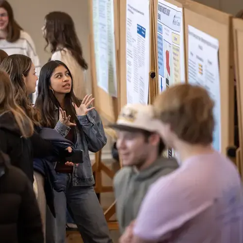 A student presents their works at the 2026 Holy Cross academic conference