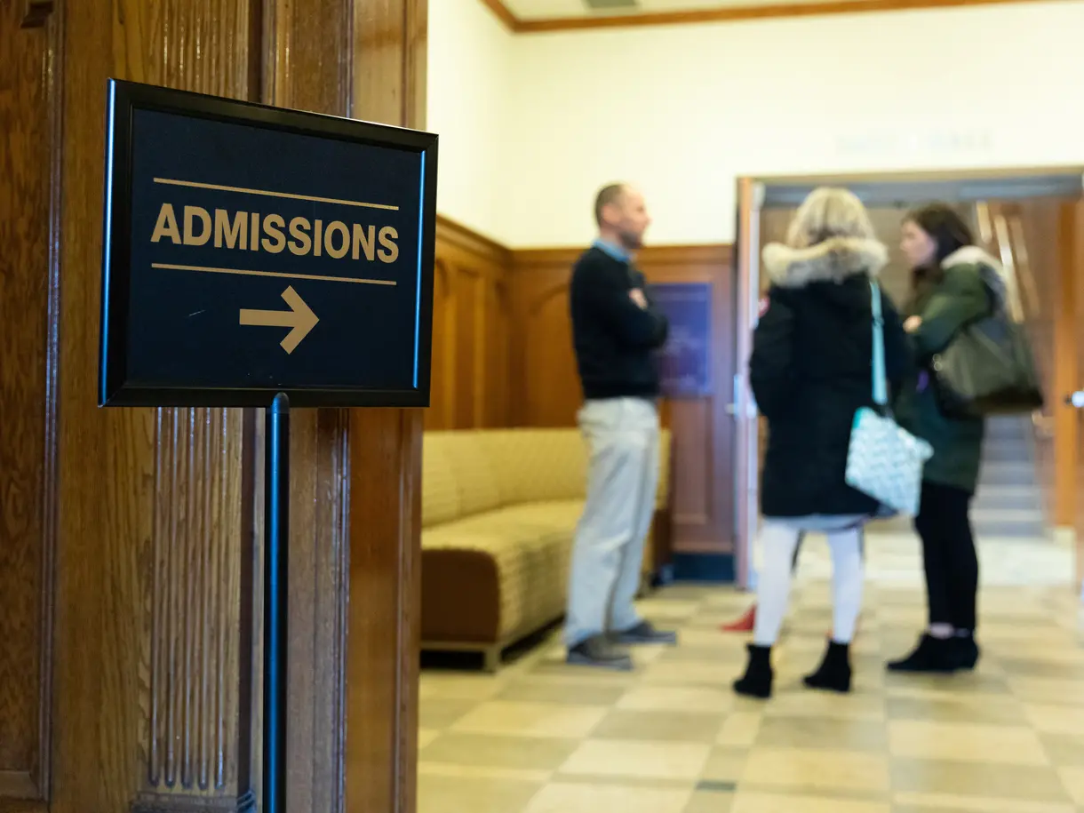 Admissions sign directing to the admissions office 