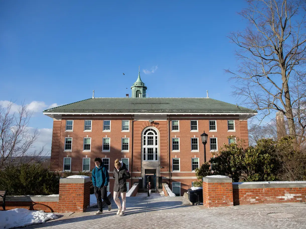 Students walking outside Alumni Hall