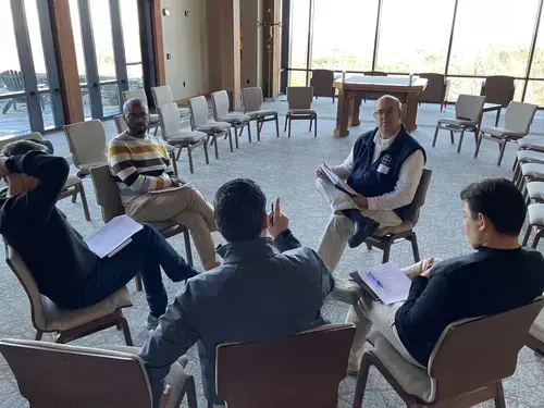 Faculty hold a conversation at the JCC