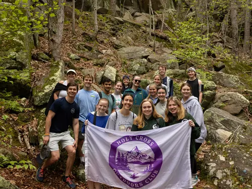The Holy Cross Outdoor Club poses for a photo