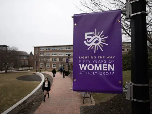 50th anniversary of coeducation sign on the Holy Cross campus