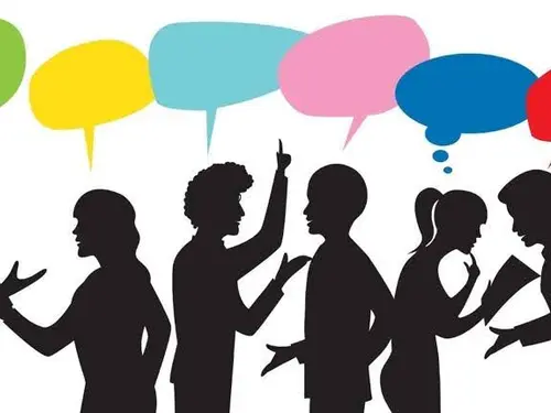 People communicating via multicolored speech bubbles