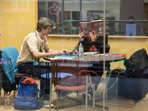 Students studying quantum mechanics