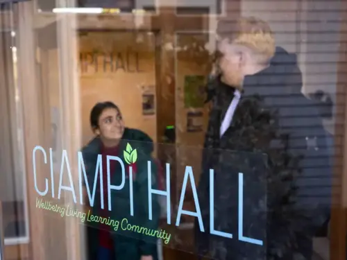 students walk out of Ciampi Hall