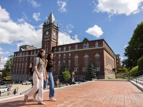 Students climbing steps of Dinand library outside of Fenwick
