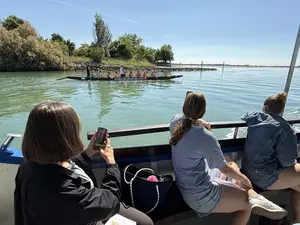 Professor and Chair of the Department of Visual Arts at Holy Cross David Karmon leads students during a Maymester in Venice, Italy between May 20th and 30th, 2025. 