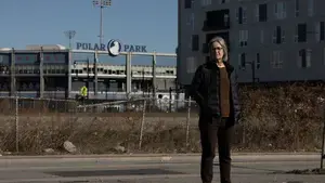 Woman in construction site/parking lot