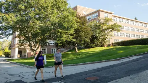 Students walking outside Clark Hall