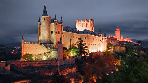 Castle illuminated at night in Spain