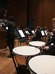 The Holy Cross Orchestra rehearses before celebrating the 50th Anniversary of Coeducation with a concert at the Luth Concert Hall on November 16, 2022 at the Prior Performing Arts Center in Worcester, Massachusetts.