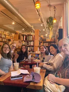 Montserrat Faculty and student ambassadors meet at a coffee shop
