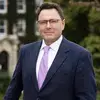 Portrait of Holy Cross' provost in a suit