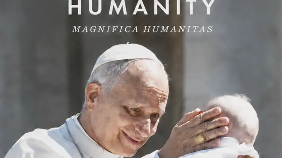 Pope Leo XIV blesses a baby