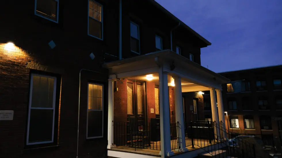 Porch light on a building at night