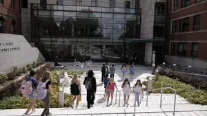 Students walk into the Integrated Science Complex